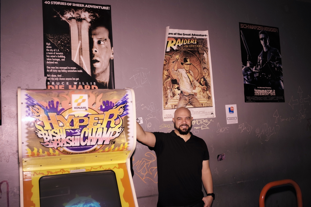 Eduardo de la Iglesia poses in Next Level Arcade Bar. 