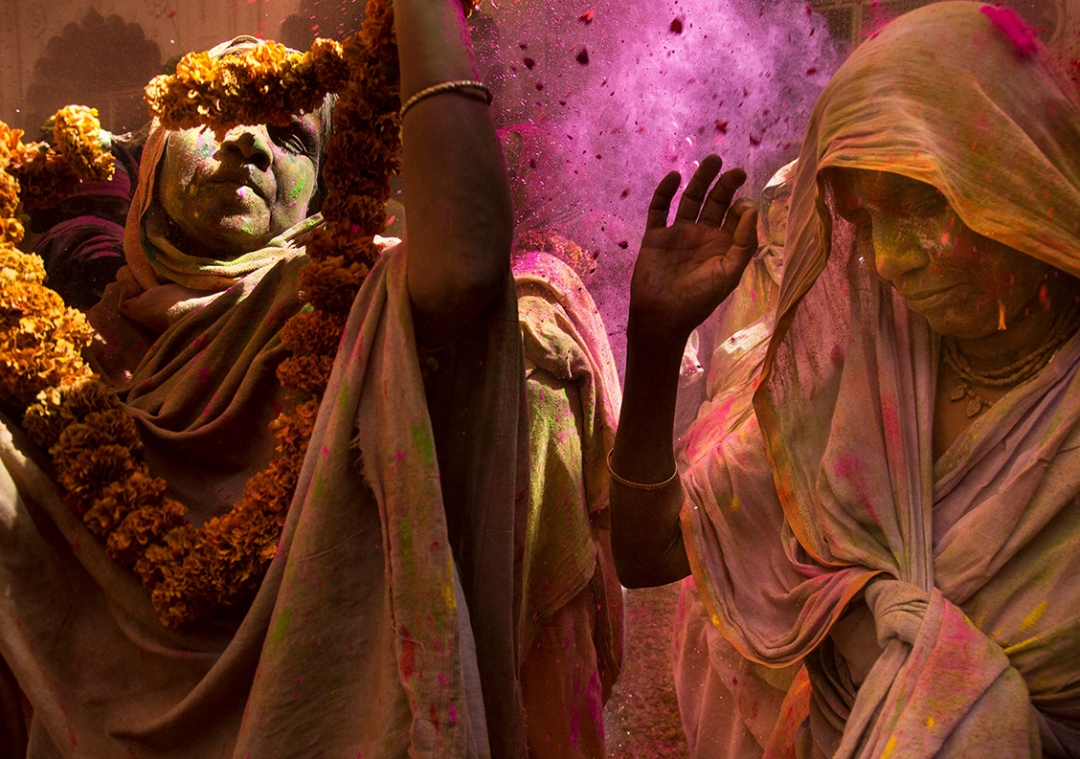 Photo of Women participating in the Holi ceremony